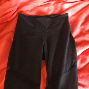 Black leggings with mesh panels